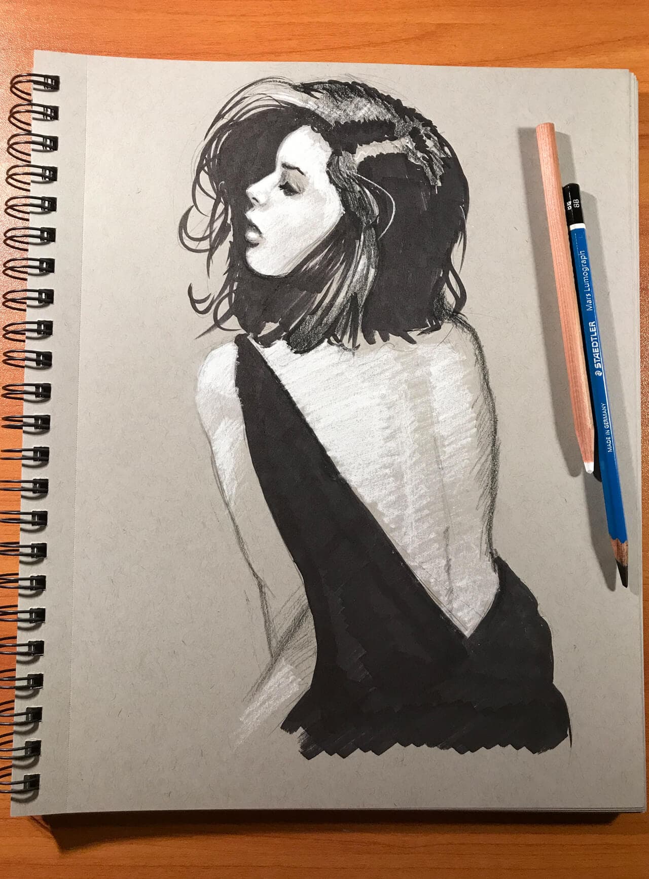 Mixed media sketch of woman in black dress, back turned