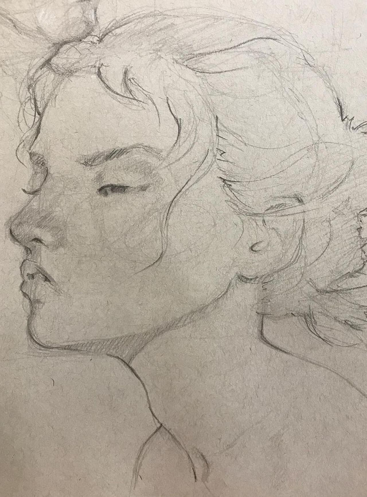 Light graphite sketch of a woman in three quarter view with her hair up