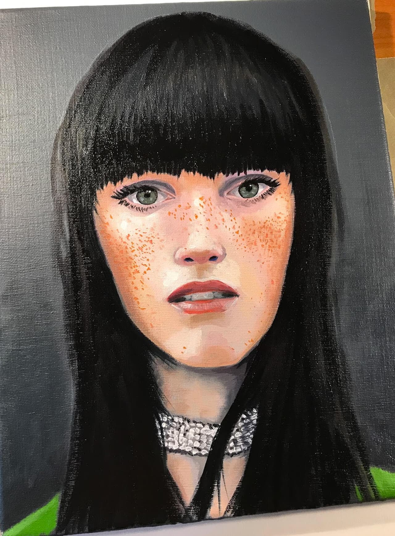 Oil painting, woman in green shirt with long black hair, looking straigt ahead