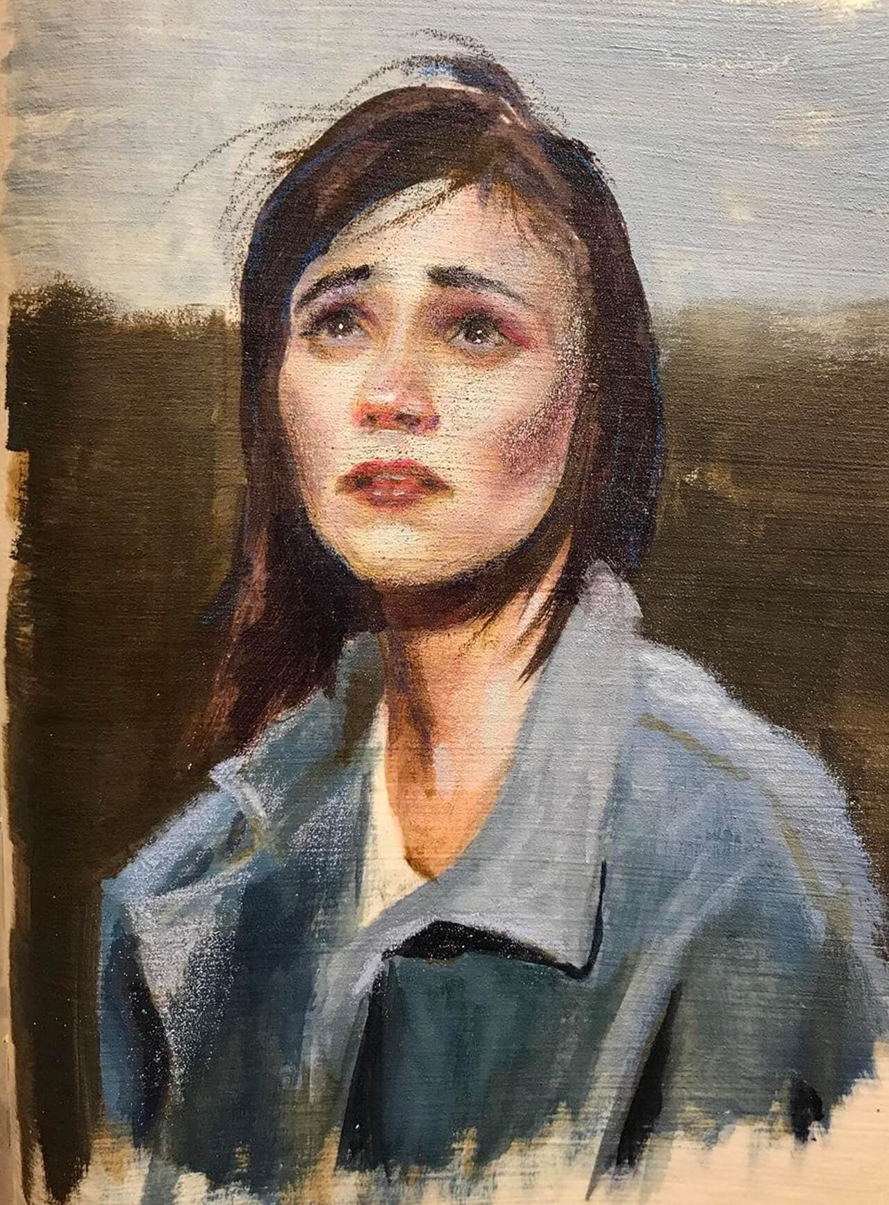 Acrylic painting, brown haired woman in blue coat looking skyward
