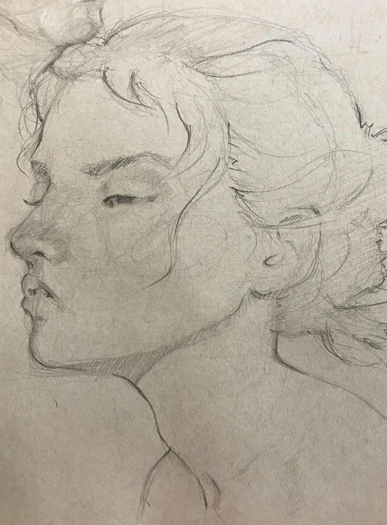 Light graphite sketch of a woman in three quarter view with her hair up